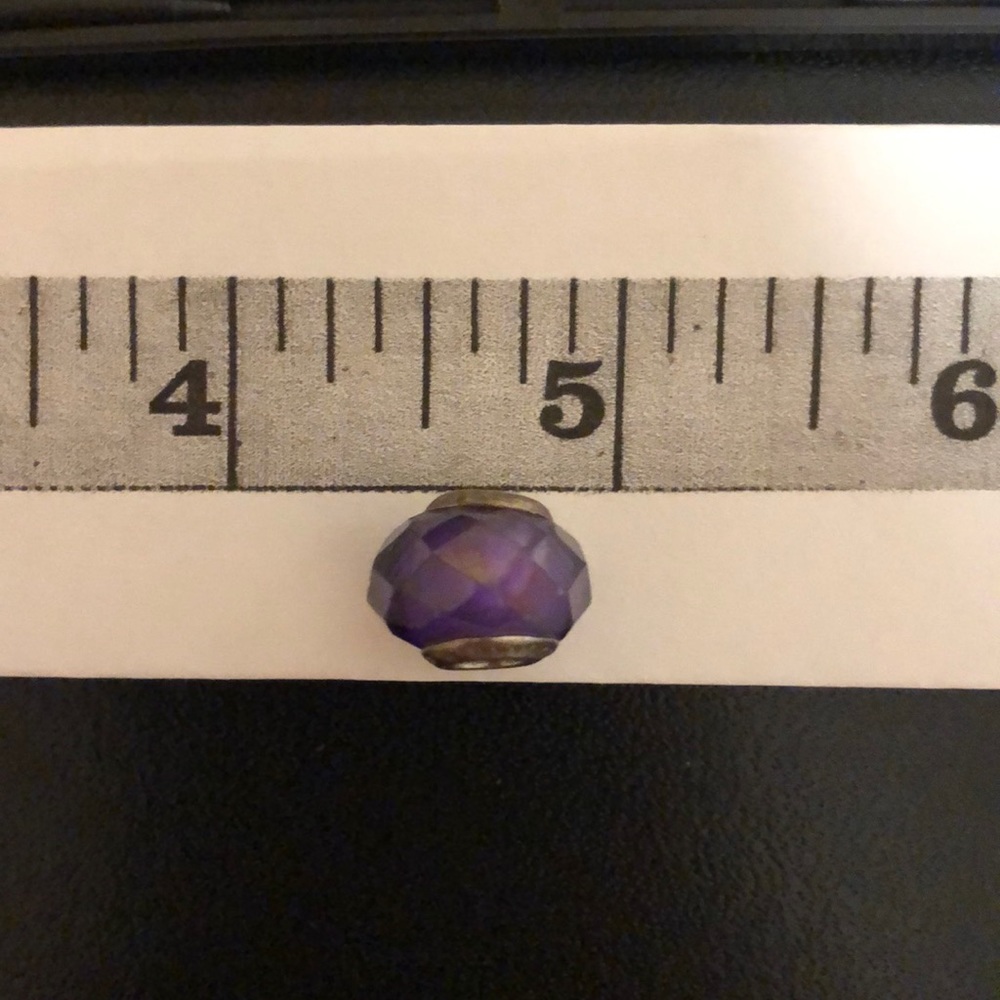 Beautiful amethyst with Pandora Charm. Sparkles!